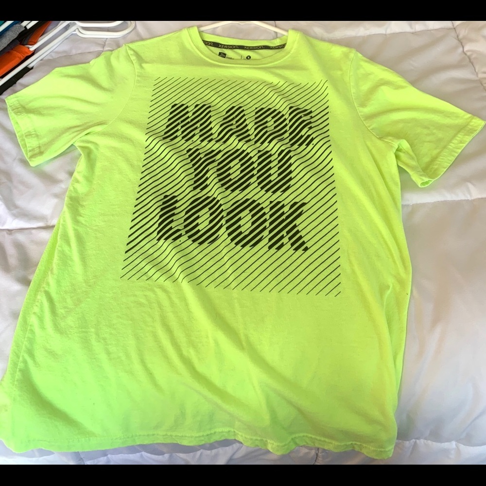 Selling is slightly used Xersion shirt
